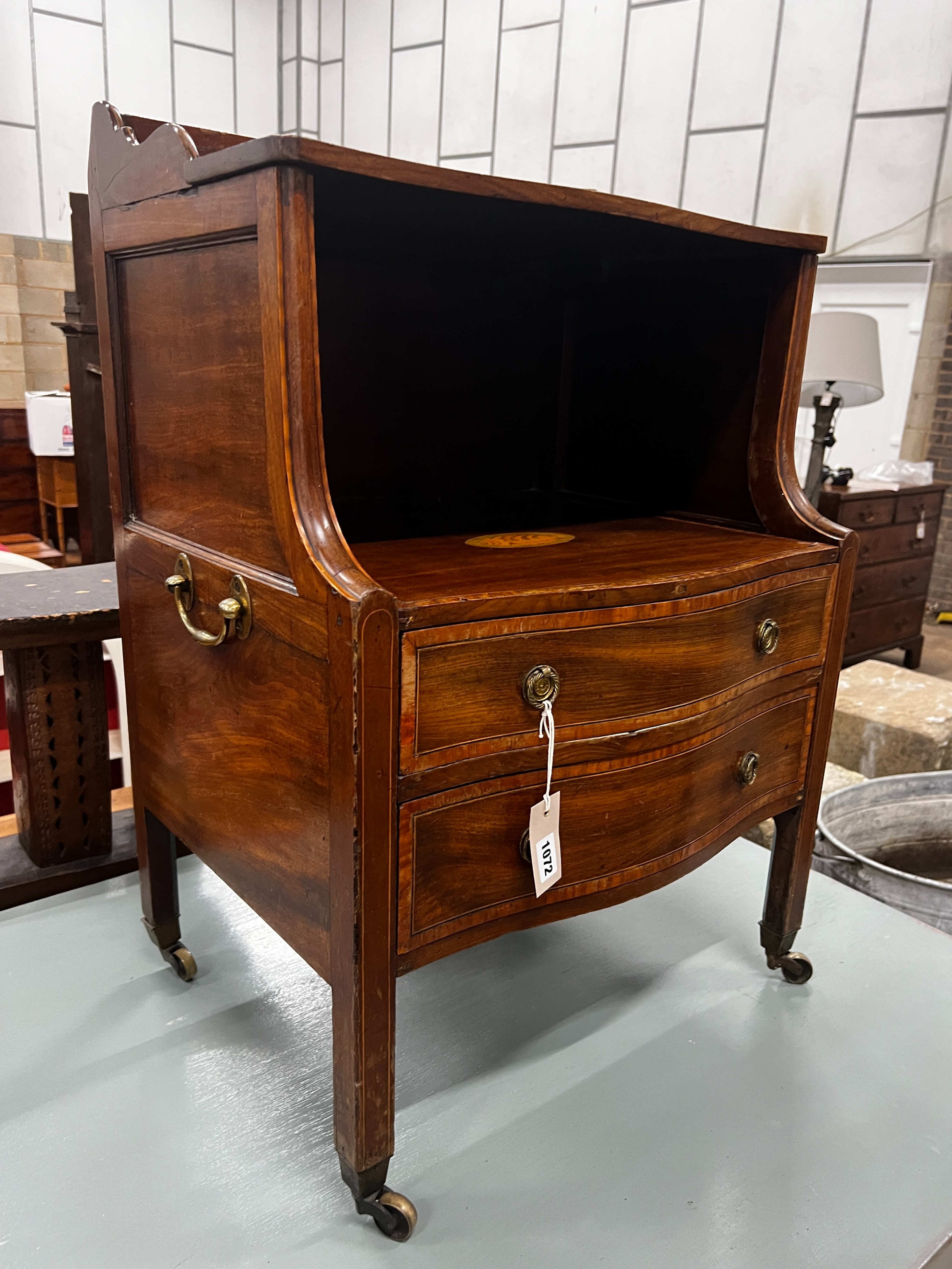 A George III inlaid mahogany serpentine front bedside chest, width 55cm, depth 42cm, height 80cm